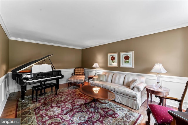 11 Georges Way, Glen Mills, PA 19342 - living area featuring crown molding, wood finished floors, wainscoting, and a decorative wall