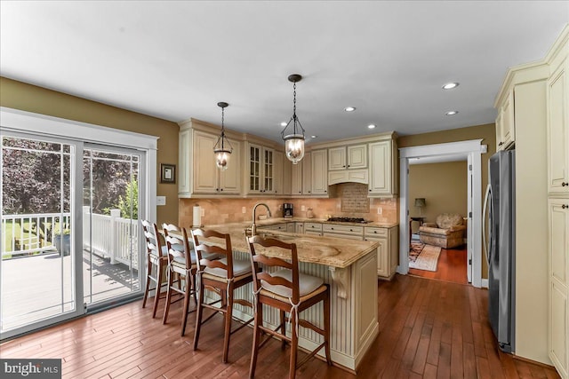 11 Georges Way, Glen Mills, PA 19342 - kitchen featuring cream cabinets, stainless steel appliances, light stone countertops, dark wood-style floors, and recessed lighting