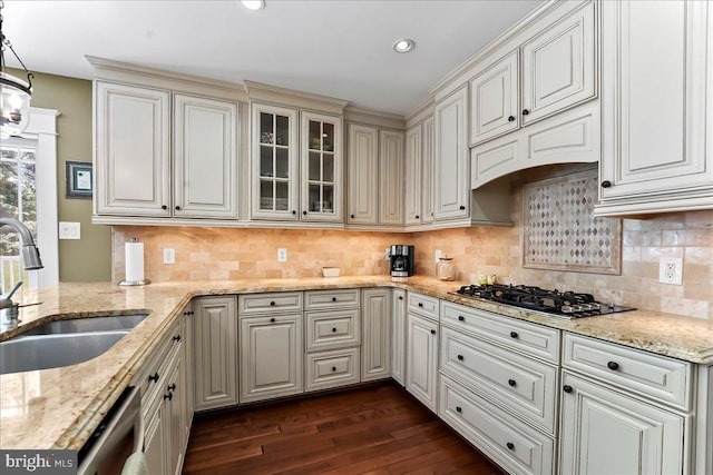 11 Georges Way, Glen Mills, PA 19342 - kitchen featuring dark wood-style flooring, gas stovetop, light stone countertops, decorative backsplash, and glass insert cabinets