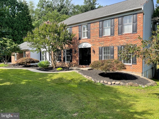 11 Georges Way, Glen Mills, PA 19342 - colonial house with a front lawn and brick siding