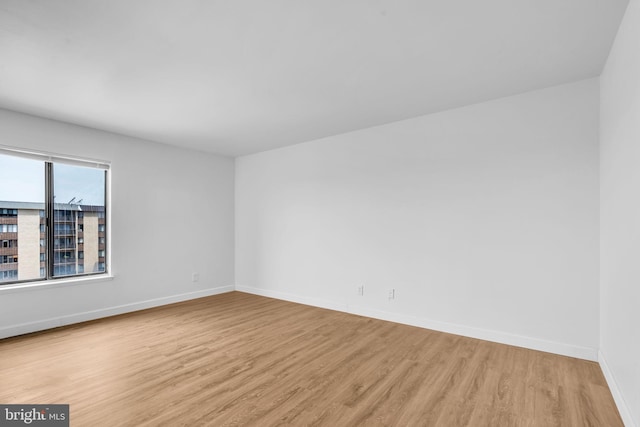 3100 S Manchester St Unit 827, Falls Church, VA 22044 - unfurnished room with light wood finished floors and baseboards