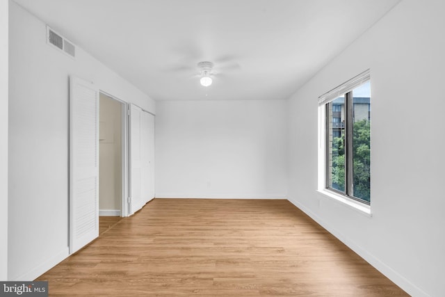 3100 S Manchester St Unit 827, Falls Church, VA 22044 - unfurnished bedroom with light wood finished floors and a ceiling fan