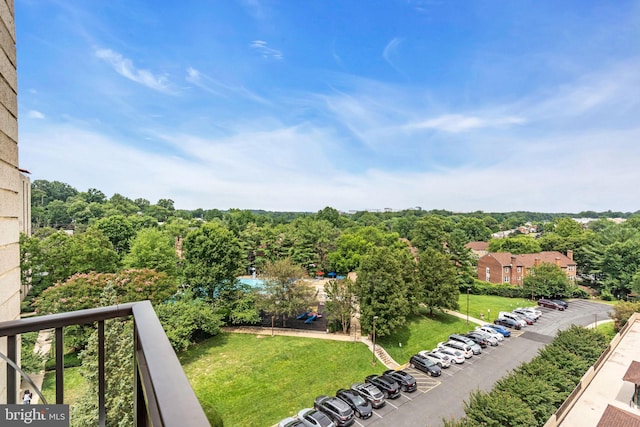 3100 S Manchester St Unit 827, Falls Church, VA 22044 - view of yard featuring a balcony and a wooded view