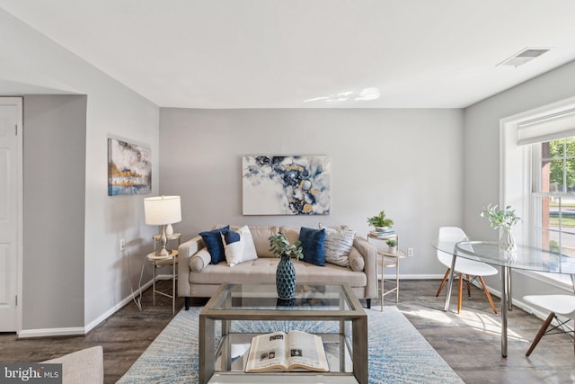 6728 Offutt Ln Unit 200A, Bethesda, MD 20815 - living room with baseboards and wood finished floors