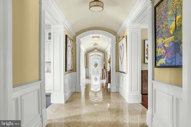1315 Canal Rd, Princeton, NJ 08540 - corridor with ornate columns, a decorative wall, arched walkways, a wainscoted wall, and crown molding
