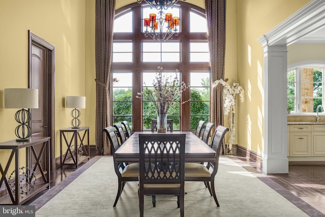 1315 Canal Rd, Princeton, NJ 08540 - dining area featuring a chandelier, a towering ceiling, and decorative columns