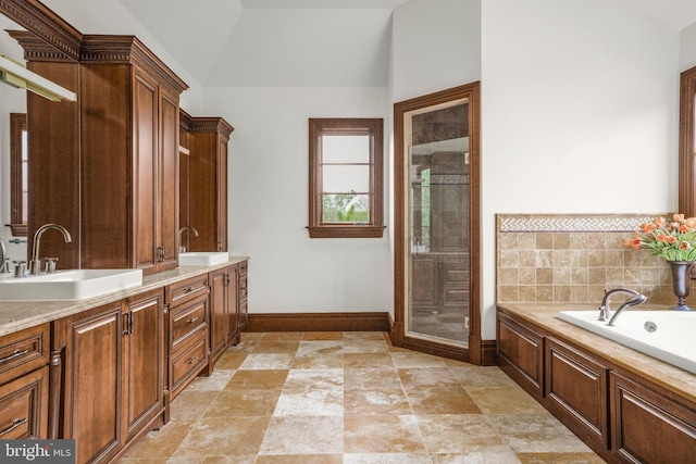 1315 Canal Rd, Princeton, NJ 08540 - bathroom with a bath, vaulted ceiling, double vanity, a shower stall, and stone finish floors