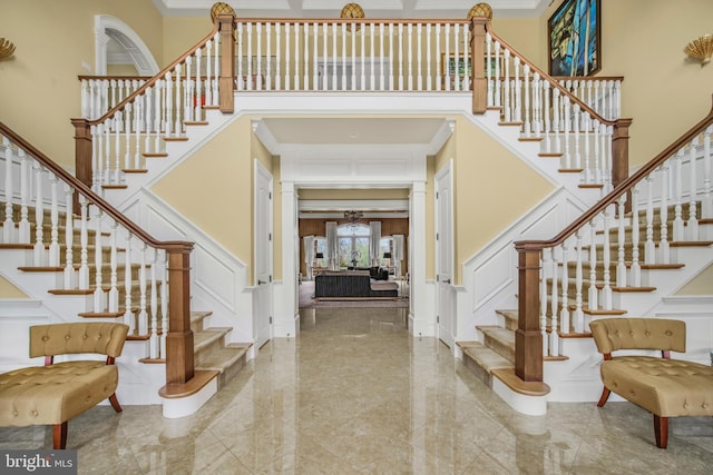 1315 Canal Rd, Princeton, NJ 08540 - entrance foyer featuring a towering ceiling, a decorative wall, stairs, marble tiled floors, and ornamental molding