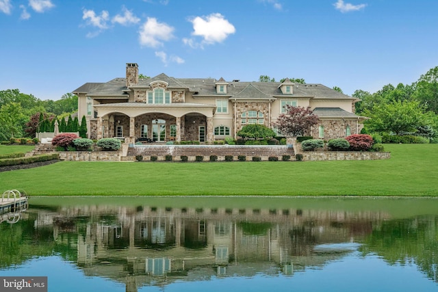 1315 Canal Rd, Princeton, NJ 08540 - back of property featuring a lawn, a water view, stone siding, and a chimney