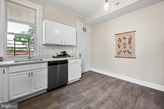 2011 Boone St, Baltimore, MD 21218 - kitchen featuring dishwasher, light countertops, dark wood-style floors, and white cabinetry