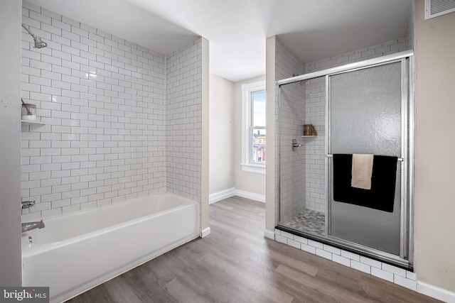 2011 Boone St, Baltimore, MD 21218 - full bath featuring wood finished floors and baseboards