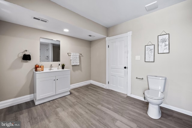 2011 Boone St, Baltimore, MD 21218 - bathroom featuring vanity, wood finished floors, and recessed lighting