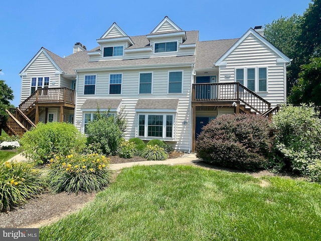 101 Lexington Way, Morgantown, PA 19543 - view of front facade with stairs, a chimney, roof with shingles, and a deck