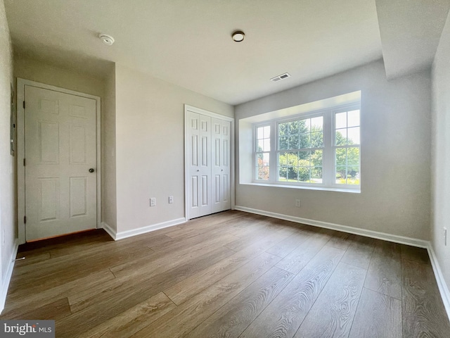 101 Lexington Way, Morgantown, PA 19543 - unfurnished bedroom with wood finished floors and a closet