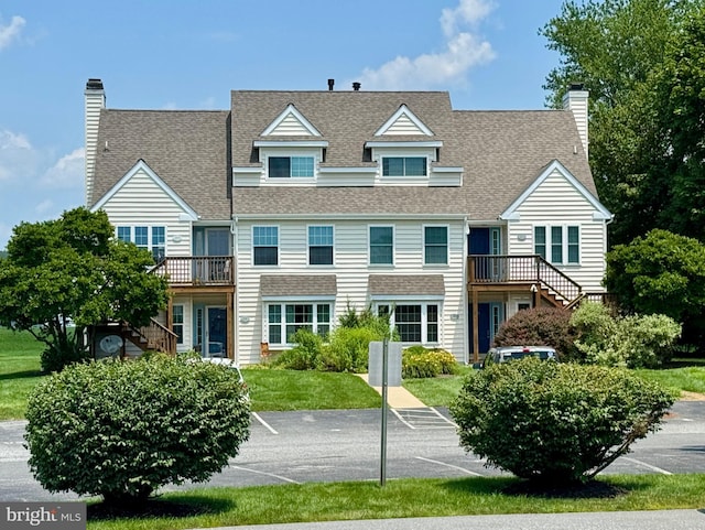 101 Lexington Way, Morgantown, PA 19543 - view of front of home featuring stairs, a chimney, a shingled roof, and a deck