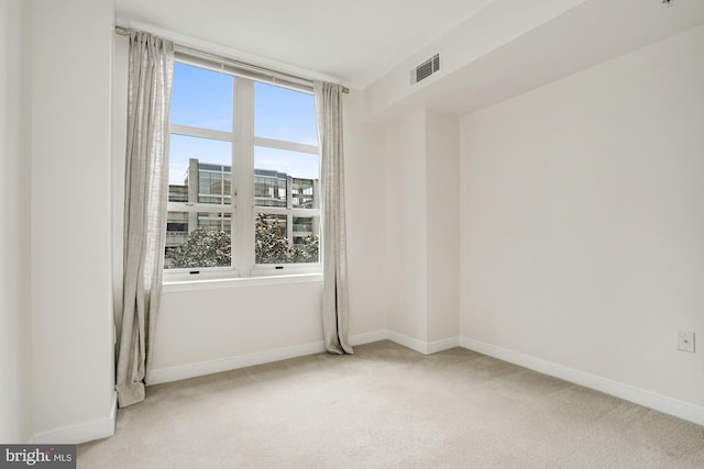 157 Fleet St Unit 303, National Harbor, MD 20745 - spare room featuring light carpet and baseboards