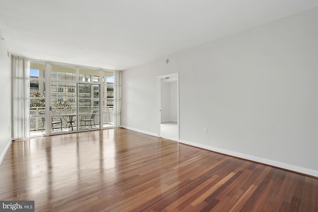 157 Fleet St Unit 303, National Harbor, MD 20745 - empty room featuring wood finished floors and floor to ceiling windows