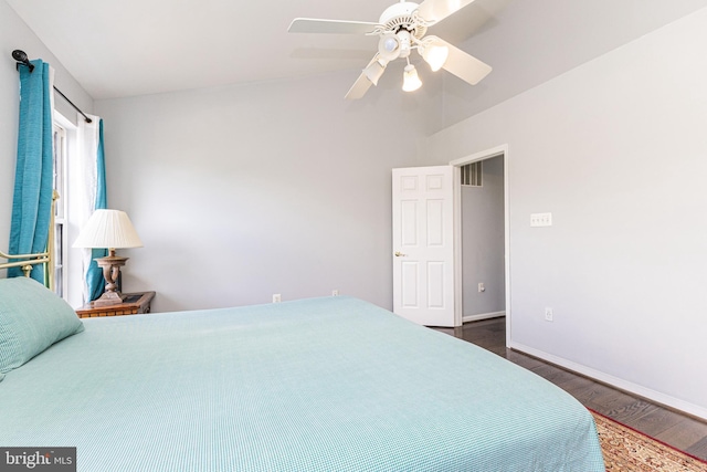 8226 Bates Rd, Lorton, VA 22079 - bedroom with dark wood-type flooring, ceiling fan, and vaulted ceiling