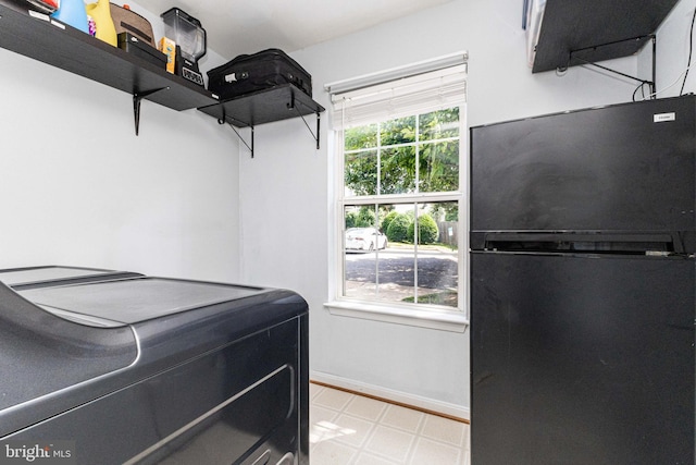 8226 Bates Rd, Lorton, VA 22079 - laundry area featuring light flooring and baseboards