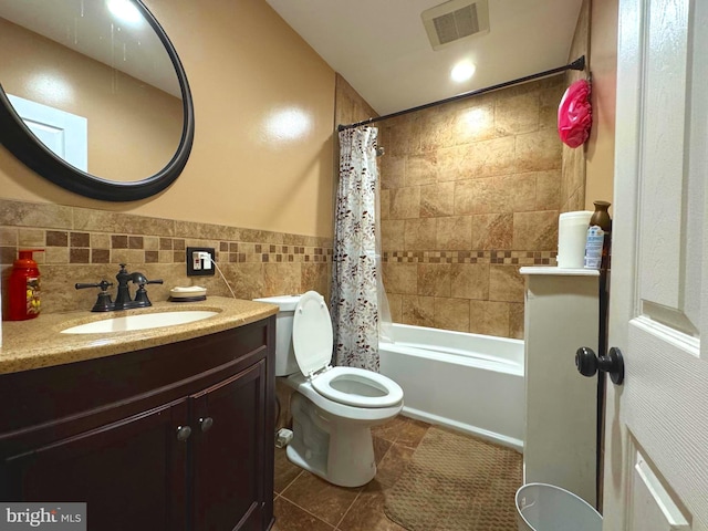 1021 Serrill Ave, Lansdowne, PA 19050 - bathroom featuring tile patterned flooring, vanity, shower / bathtub combination with curtain, and tile walls