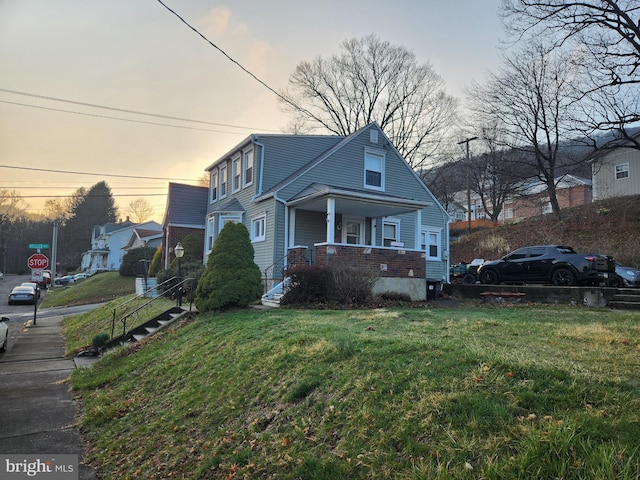 315 W Mountain Ave, Pen Argyl, PA 18072 - view of front facade featuring a porch and a front yard