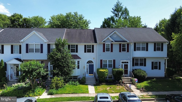 4407 Stanford Ct, Owings Mills, MD 21117 - view of property featuring entry steps and a front lawn
