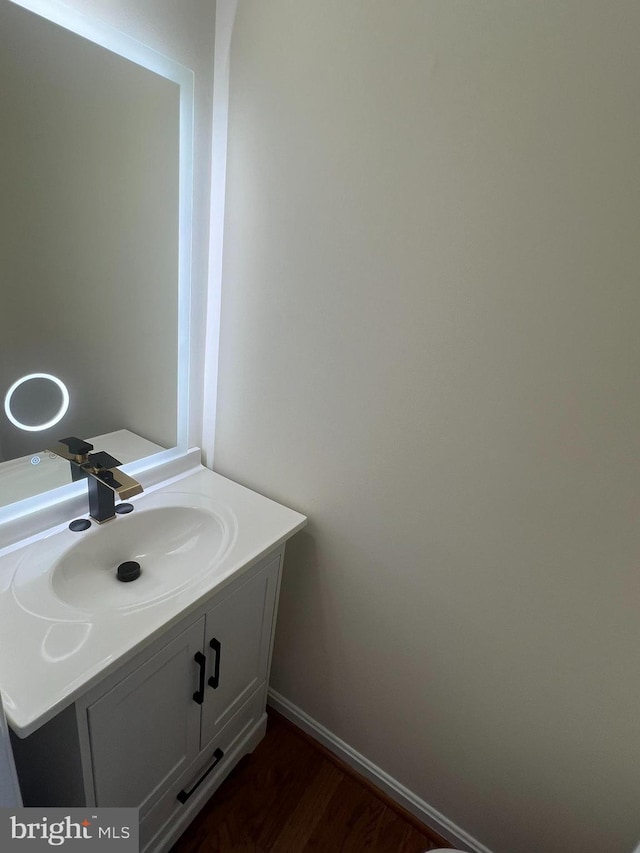 4407 Stanford Ct, Owings Mills, MD 21117 - bathroom featuring vanity and wood finished floors