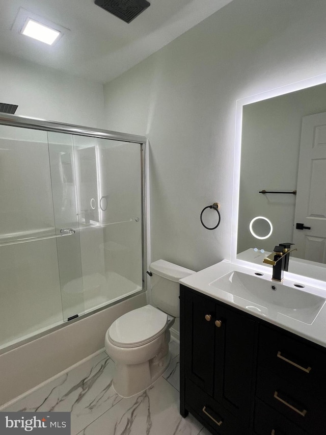 4407 Stanford Ct, Owings Mills, MD 21117 - full bathroom featuring vanity, bath / shower combo with glass door, and marble look tiles
