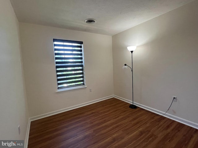 4407 Stanford Ct, Owings Mills, MD 21117 - unfurnished room featuring dark wood-style floors and baseboards