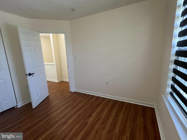 4407 Stanford Ct, Owings Mills, MD 21117 - unfurnished room with dark wood-style flooring and a pendent fire sprinkler