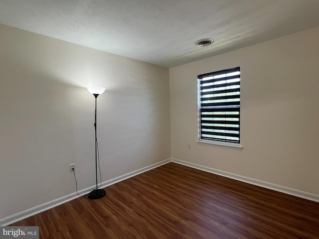 4407 Stanford Ct, Owings Mills, MD 21117 - unfurnished room with wood finished floors and baseboards