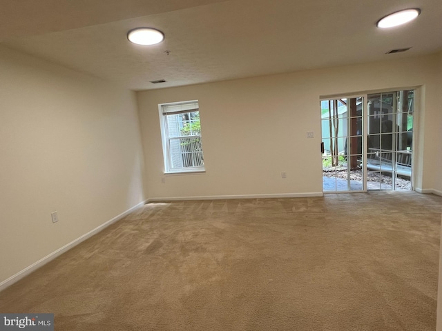 4407 Stanford Ct, Owings Mills, MD 21117 - carpeted spare room featuring baseboards