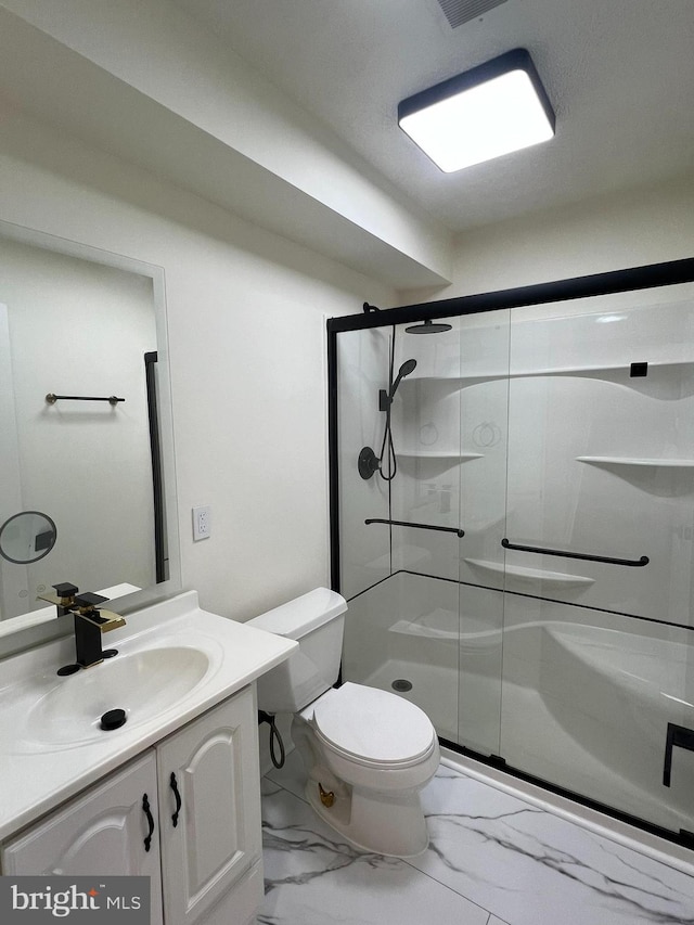 4407 Stanford Ct, Owings Mills, MD 21117 - bathroom with marble finish floors, a stall shower, and vanity