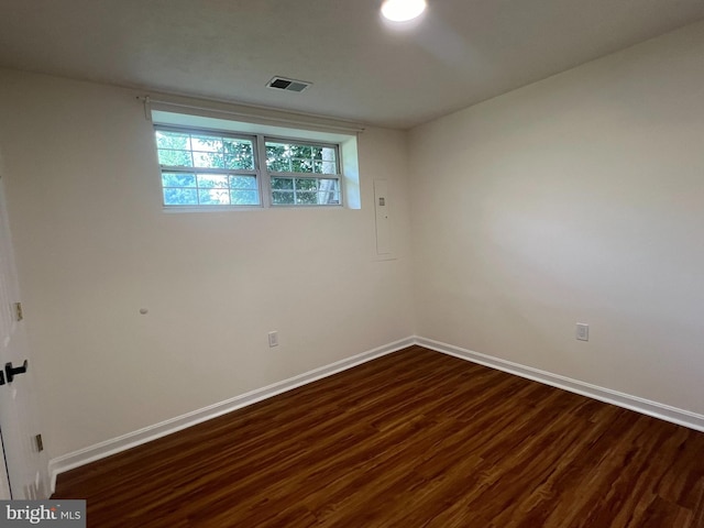4407 Stanford Ct, Owings Mills, MD 21117 - unfurnished room featuring dark wood-style flooring and electric panel