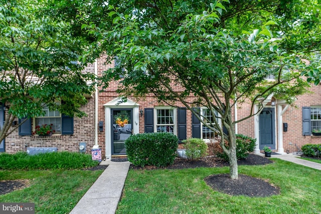 118 Roboda Blvd, Royersford, PA 19468 - view of front facade with a front yard and brick siding