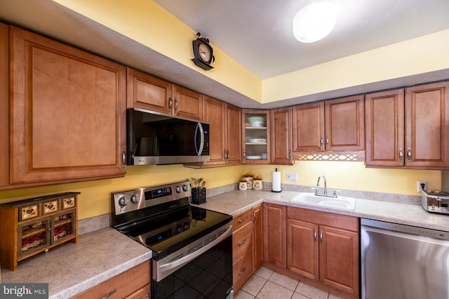 118 Roboda Blvd, Royersford, PA 19468 - kitchen with appliances with stainless steel finishes, brown cabinets, and light countertops
