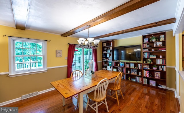118 Roboda Blvd, Royersford, PA 19468 - dining area featuring healthy amount of natural light, beam ceiling, a chandelier, and wood finished floors