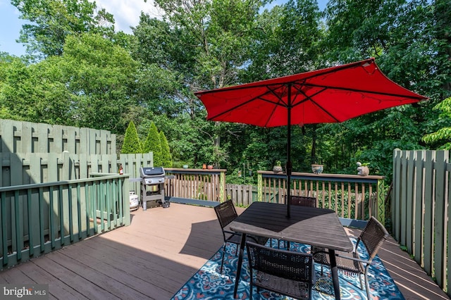 118 Roboda Blvd, Royersford, PA 19468 - wooden deck featuring outdoor dining area, grilling area, and view of wooded area