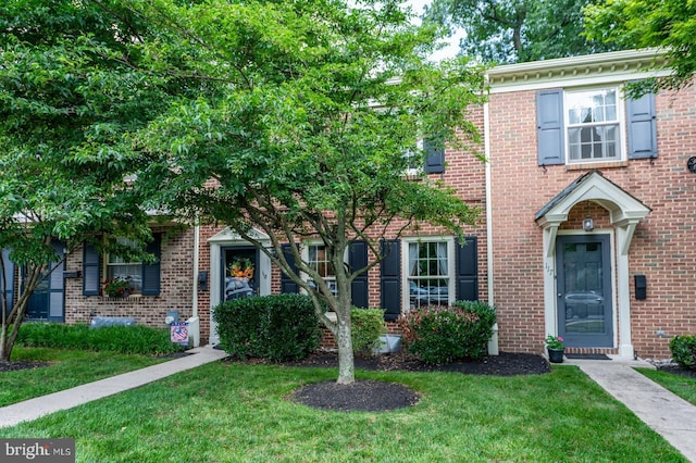 118 Roboda Blvd, Royersford, PA 19468 - view of front facade featuring a front yard and brick siding