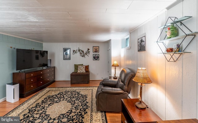 118 Roboda Blvd, Royersford, PA 19468 - living room with wood finished floors, ornamental molding, and wood walls
