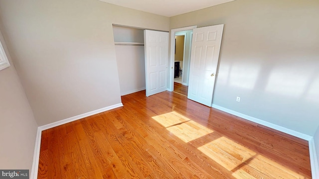 1412 Glassboro Rd, Wenonah, NJ 08090 - unfurnished bedroom with wood finished floors and a closet