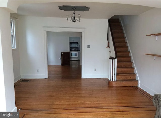 231 N Penn St, West Chester, PA 19380 - interior space featuring wood finished floors and a chandelier