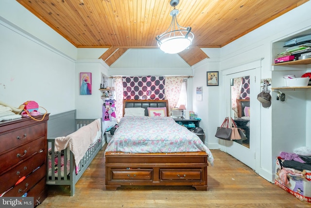 231 N Penn St, West Chester, PA 19380 - bedroom with wood ceiling, crown molding, and wood finished floors