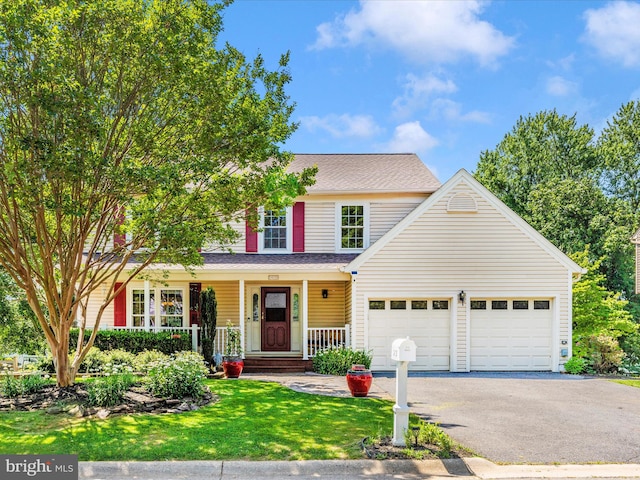 24129 Pecan Grove Ln, Gaithersburg, MD 20882 - traditional-style home featuring asphalt driveway, an attached garage, a porch, a front yard, and roof with shingles