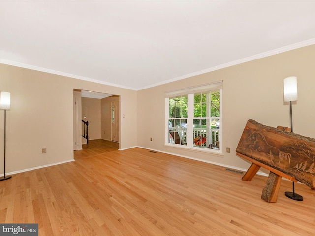 24129 Pecan Grove Ln, Gaithersburg, MD 20882 - unfurnished living room with light wood-style floors and ornamental molding