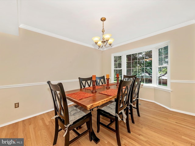 24129 Pecan Grove Ln, Gaithersburg, MD 20882 - dining area with a chandelier, light wood-style flooring, and ornamental molding