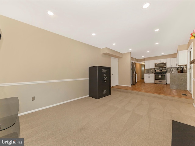 24129 Pecan Grove Ln, Gaithersburg, MD 20882 - unfurnished living room with light carpet and recessed lighting