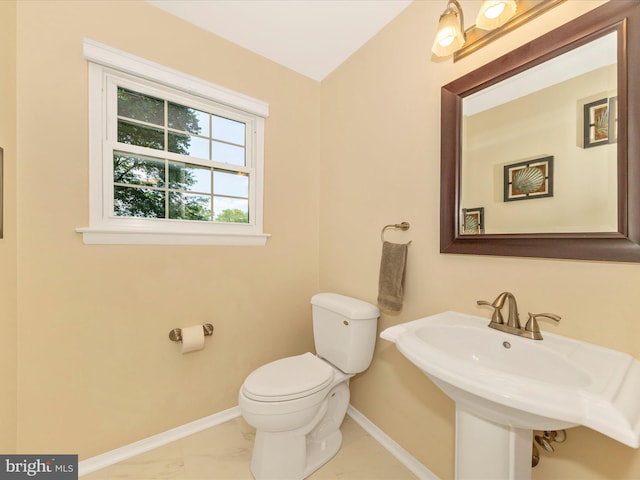 24129 Pecan Grove Ln, Gaithersburg, MD 20882 - half bathroom featuring baseboards and marble look tiles