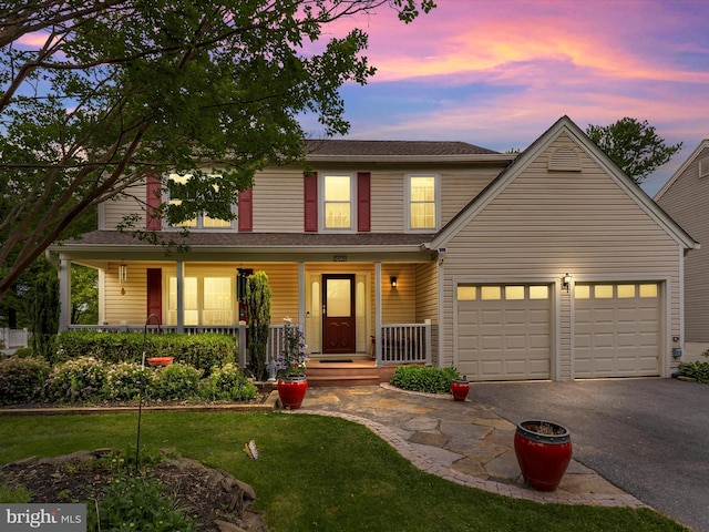 24129 Pecan Grove Ln, Gaithersburg, MD 20882 - traditional-style home featuring driveway, a porch, an attached garage, and a lawn