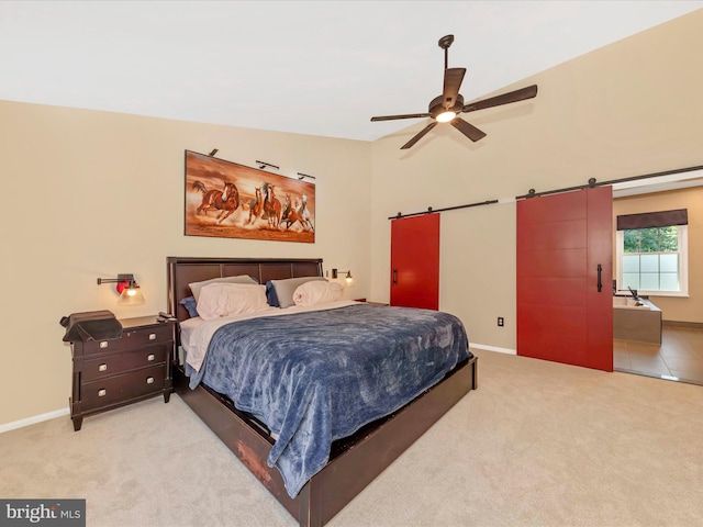 24129 Pecan Grove Ln, Gaithersburg, MD 20882 - bedroom featuring a barn door, carpet floors, and ceiling fan